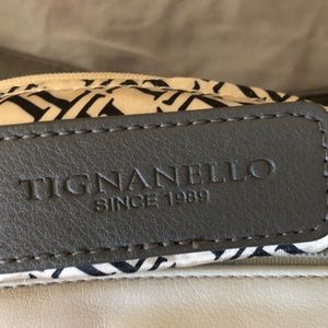 Crossbody handbags, two black, one gray.